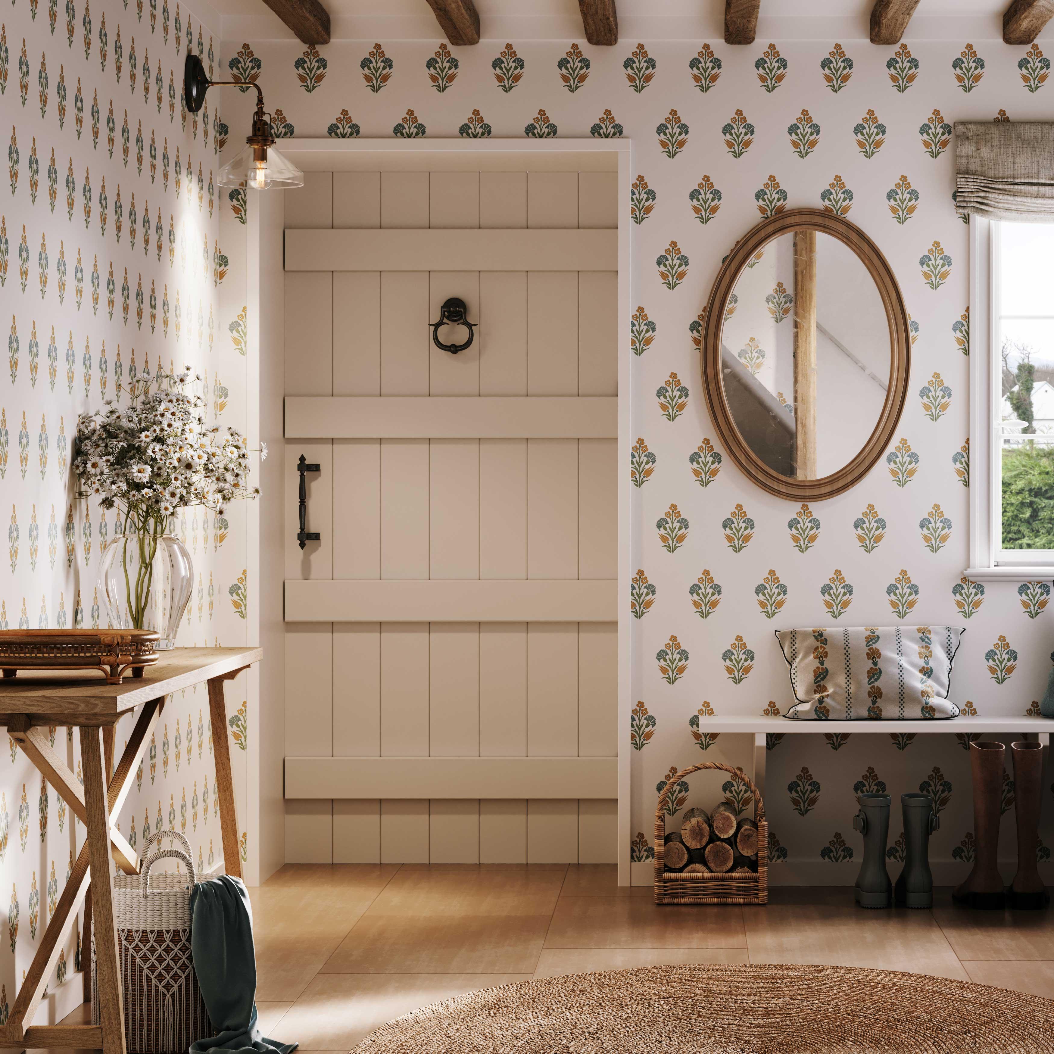 Lily Posy wallpaper in yellow styled in a bright entryway with playful floral bouquets - Huggleberry Hill