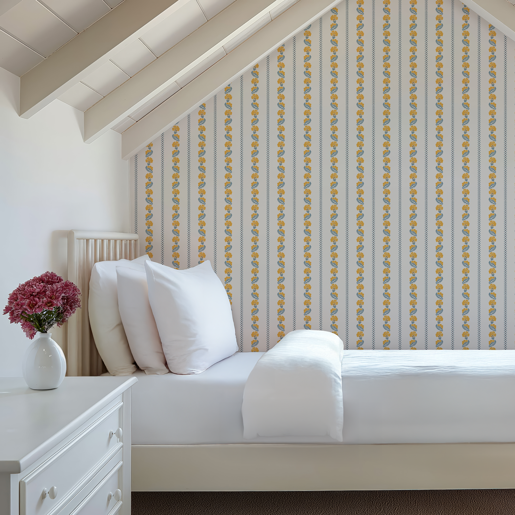 Bedroom with white bed, nightstand, and decorative wall paper.