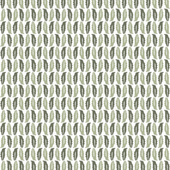 Pattern of green leaves on a beige background