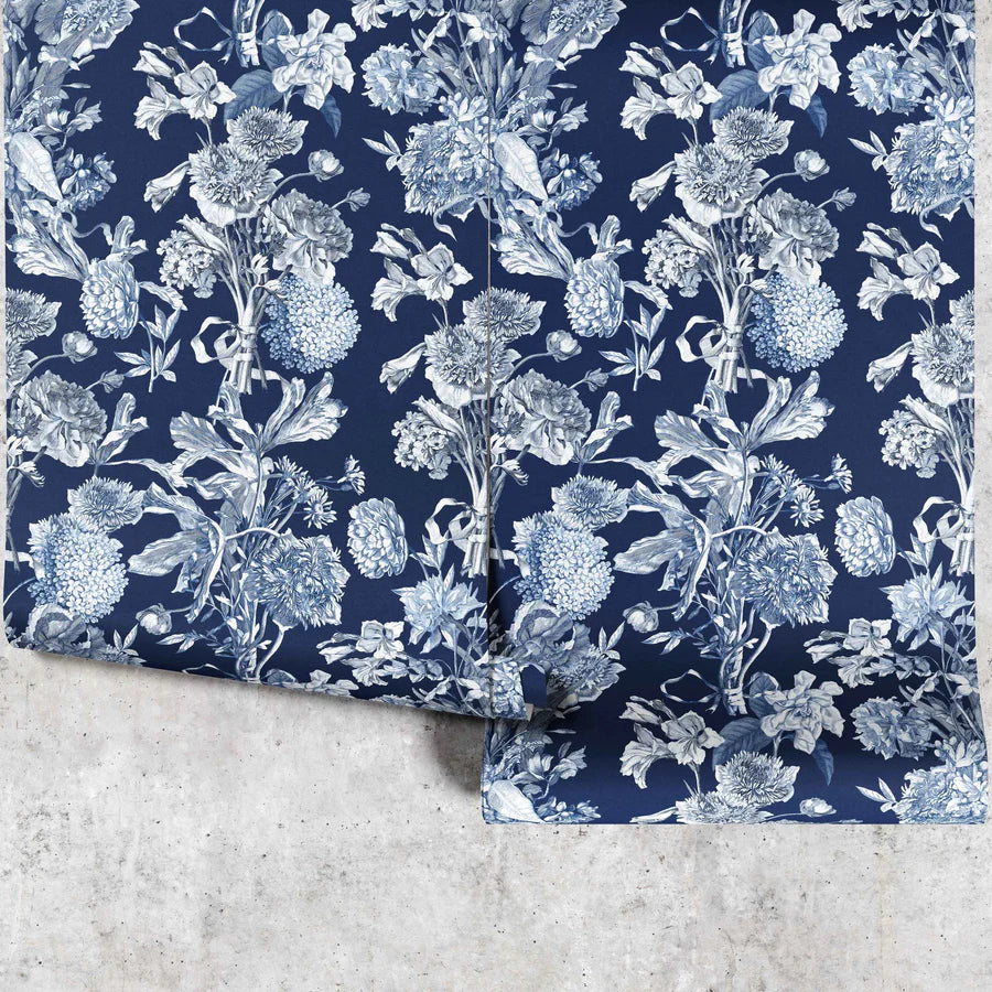 Dark blue wallpaper with french toile florals in white 