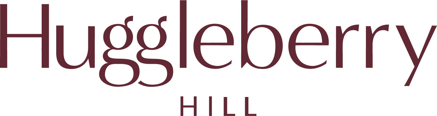 Huggleberry logo with maroon text on a white background