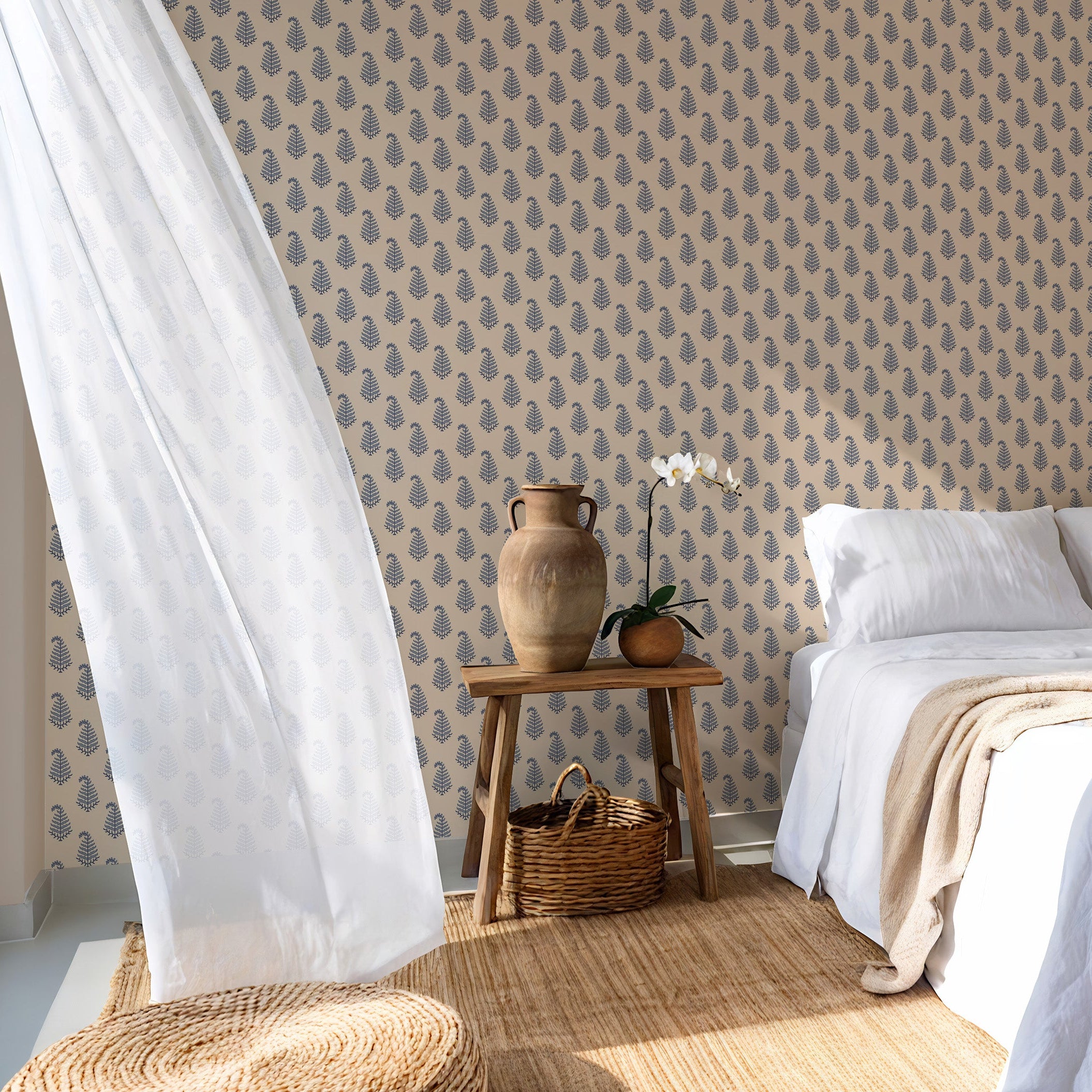 a calming breeze enters a relaxing bedroom with soft blue block print wallpaper and grounding decor