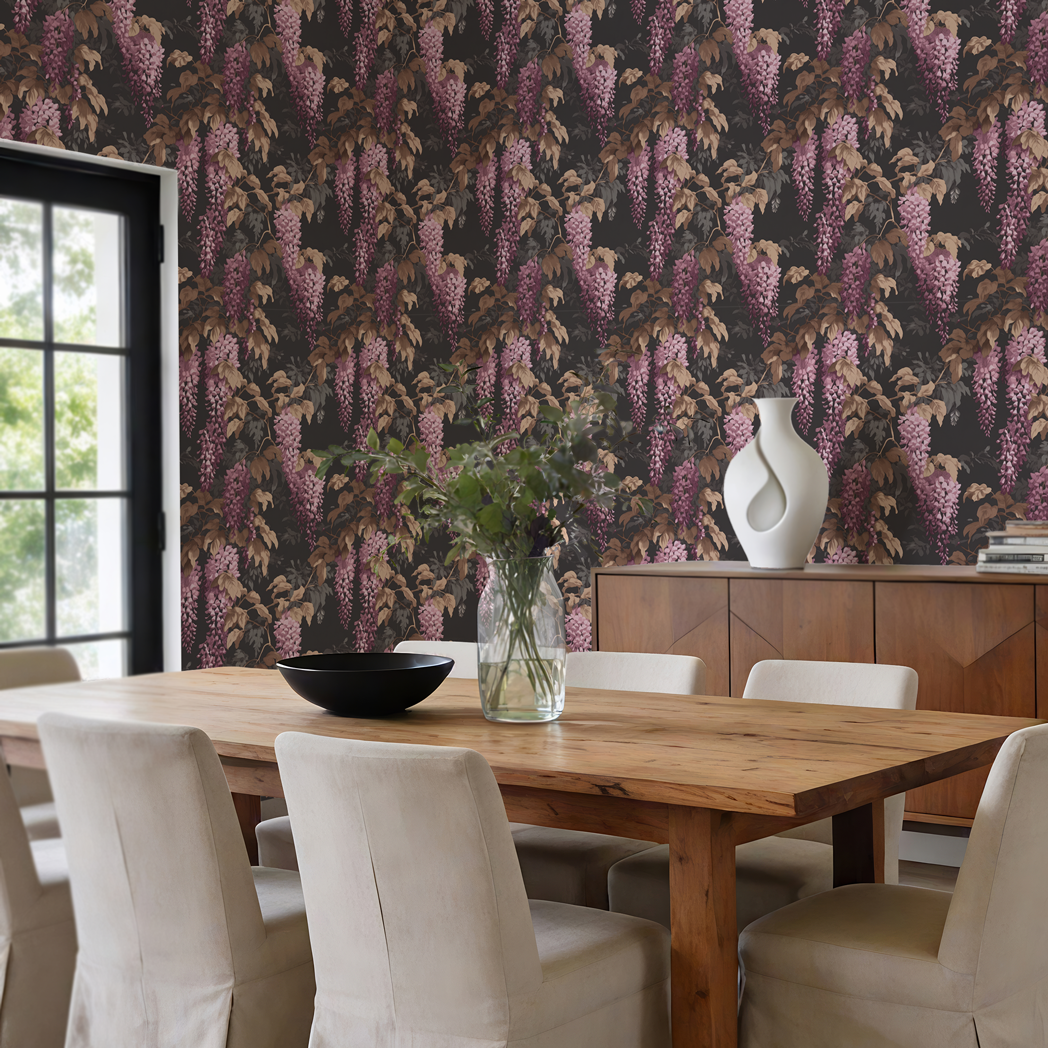 Dining room with wooden table, chairs, and floral wallpaper.