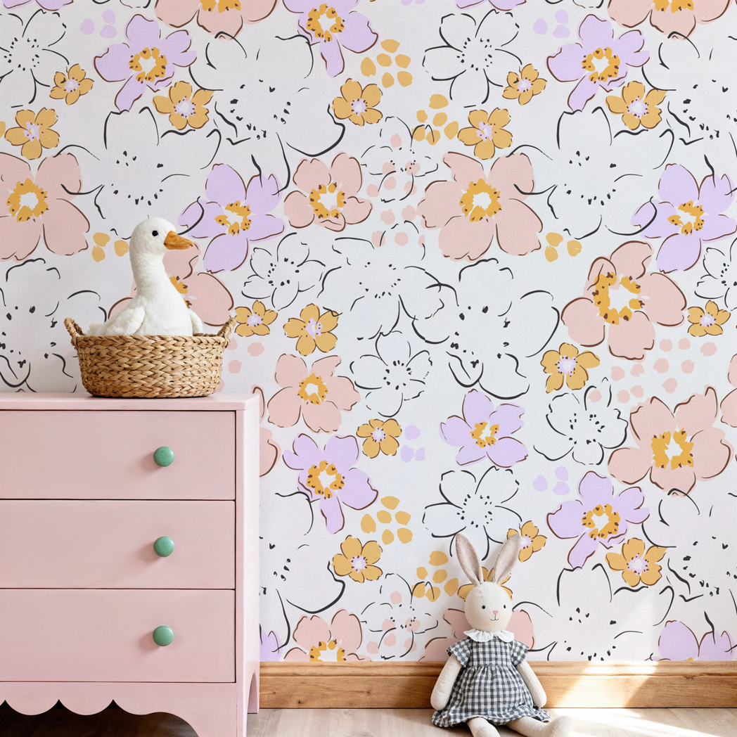 Children's room with floral wallpaper, pink dresser, and rabbit toys.