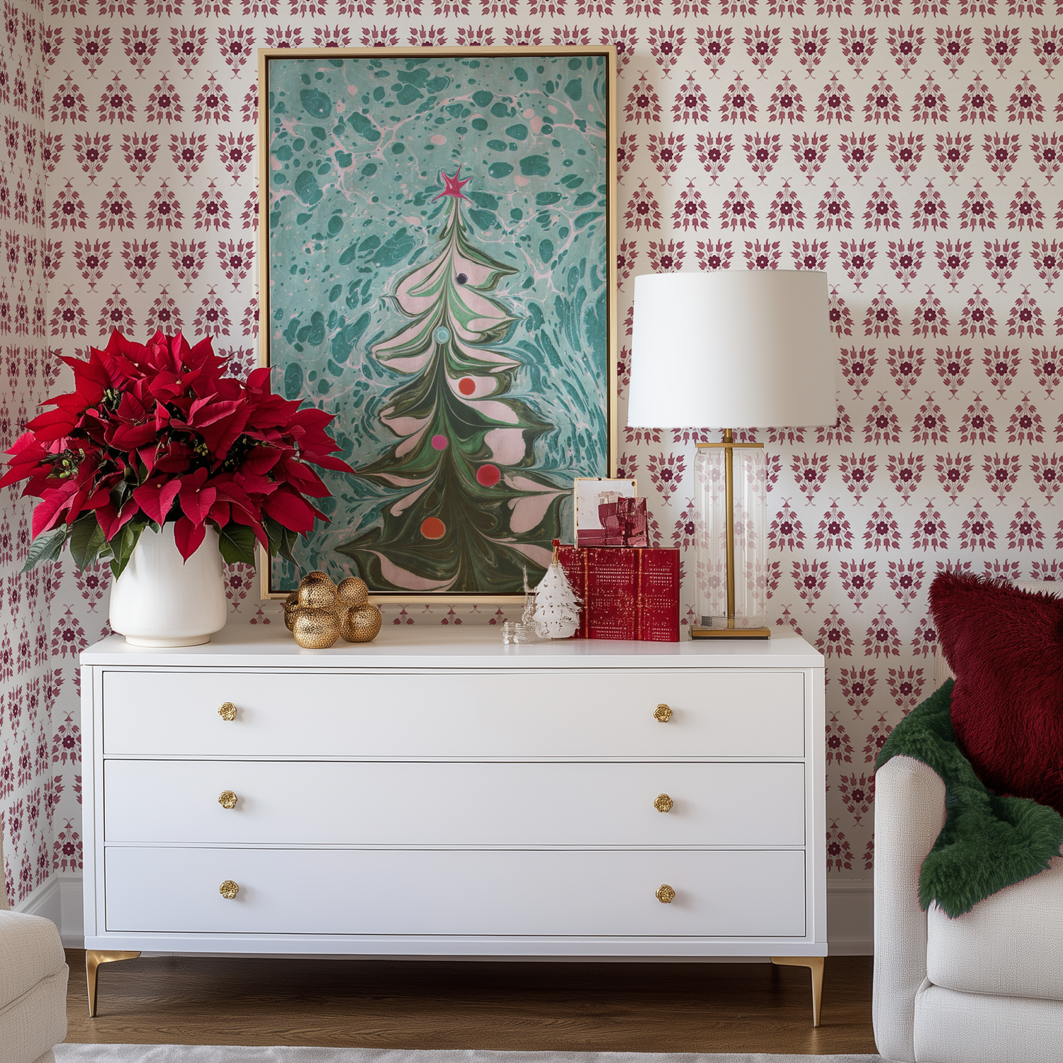 A white dresser at Christmas time with white and red posie wallpaper